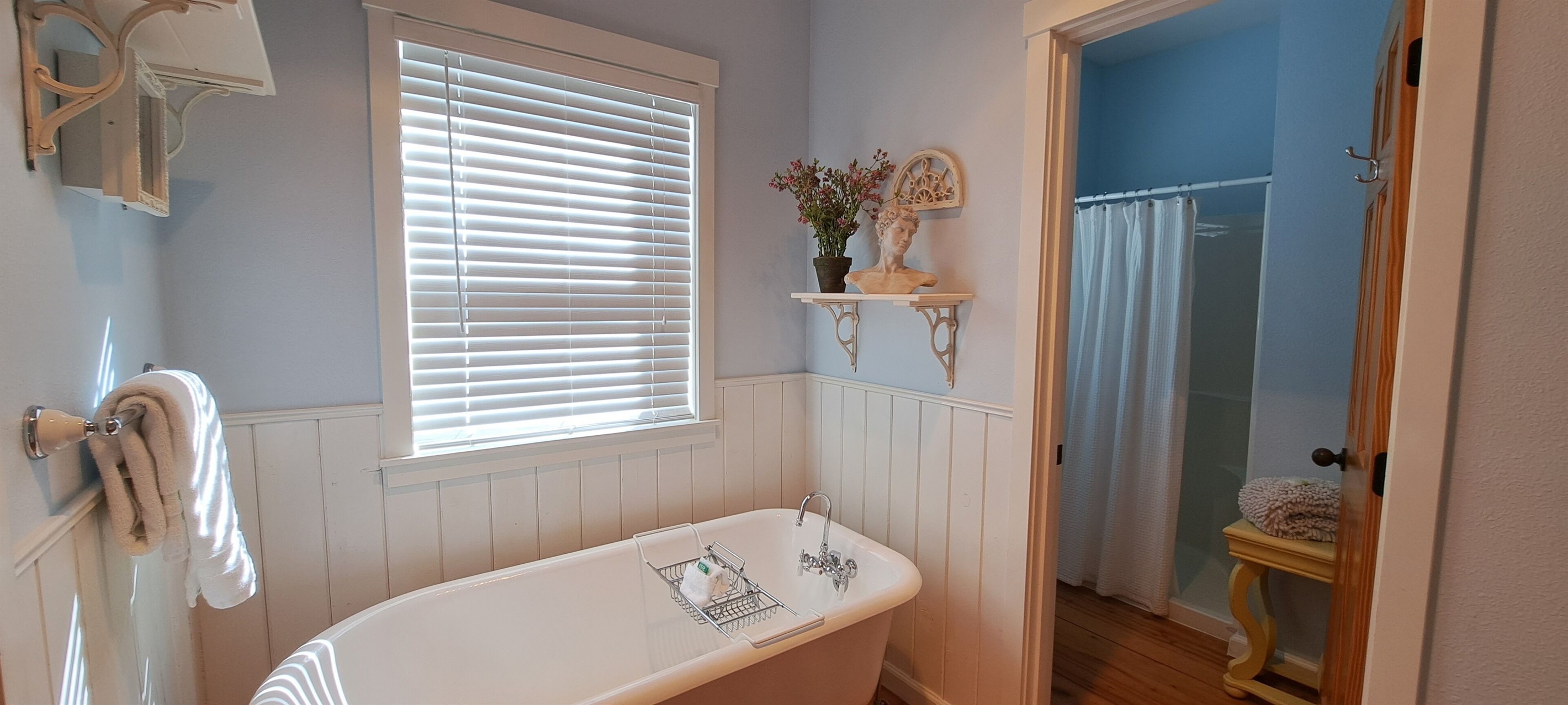 The clawfoot bathtub adds timeless charm and comfort to your stay.