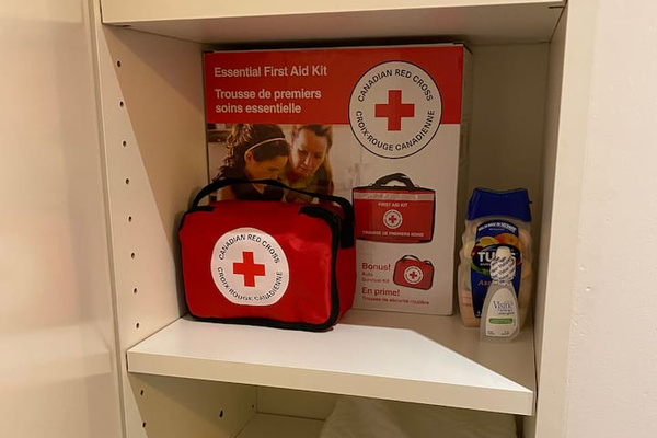 First aid kit is in the tall cabinet in the bathroom