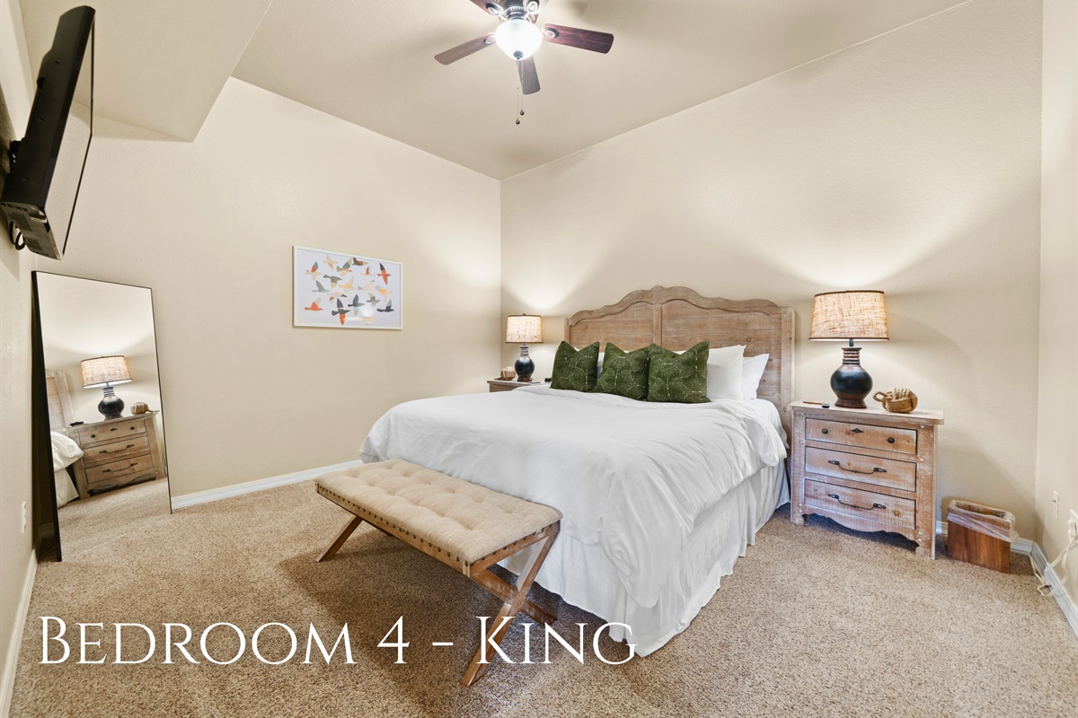 Warm tones and thoughtful decor make this king room feel inviting and restful, giving you a comfortable space to recharge after a day spent exploring or enjoying the lake.