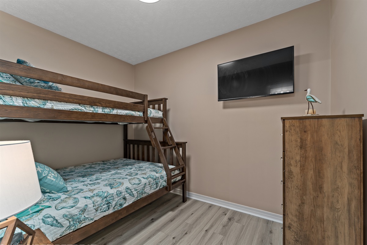 bunk bed room with TV
