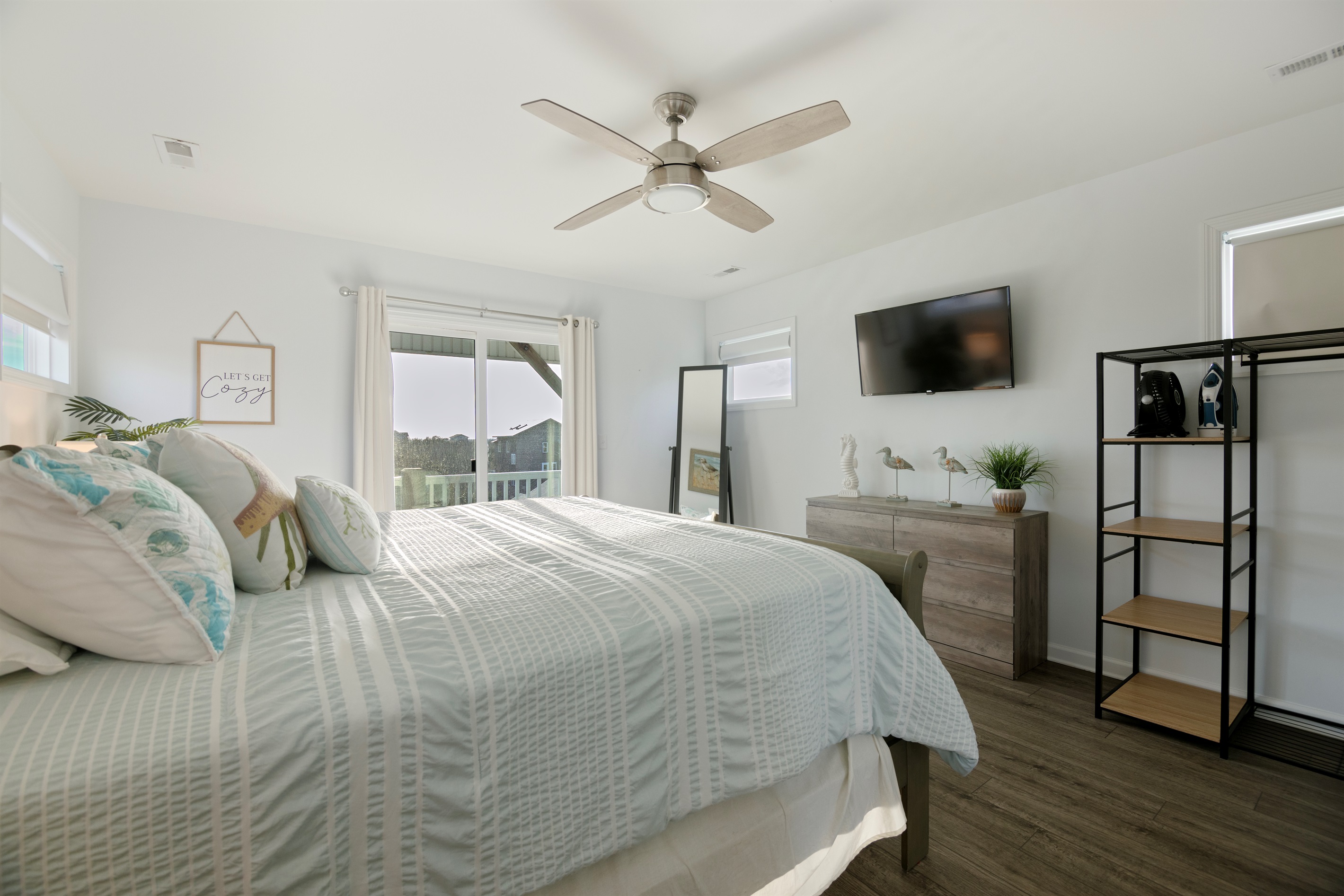 Stretch out in this king suite with a smart TV, fan, and space to unpack