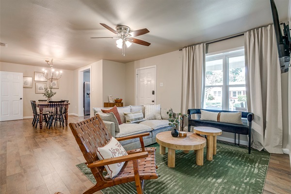 Open-concept space connecting the living and dining areas with stylish decor