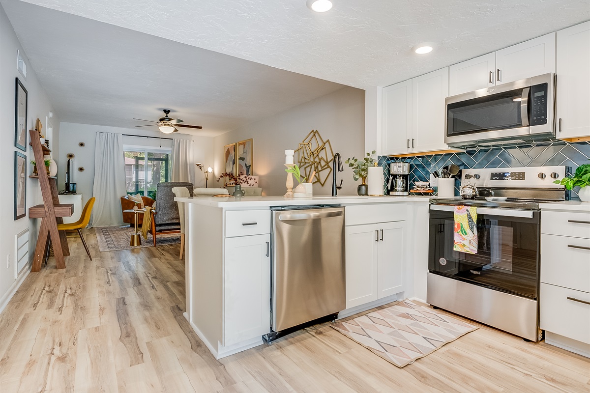 Bright white cabinetry keeps the space feeling fresh and open.