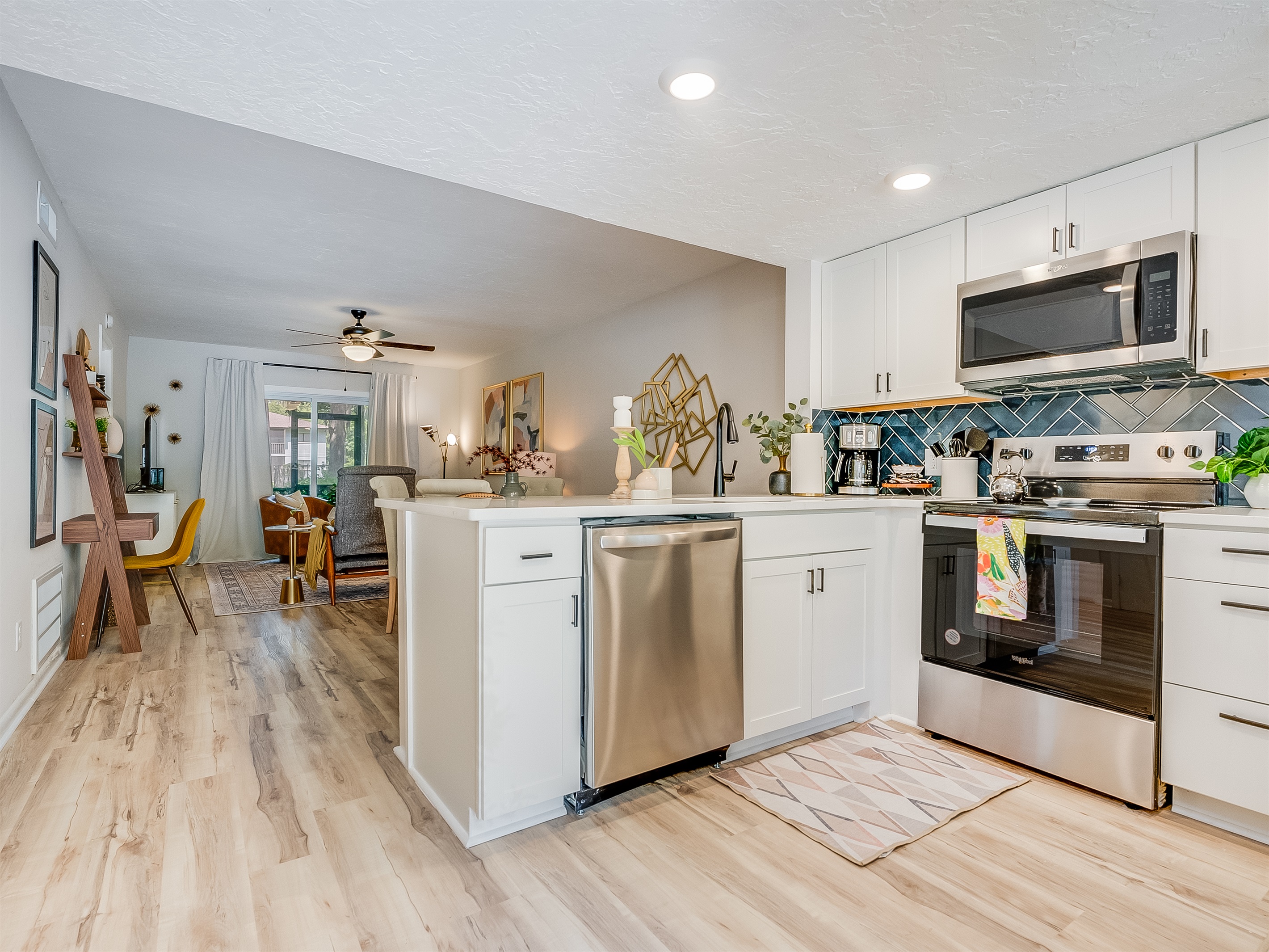 Bright white cabinetry keeps the space feeling fresh and open.