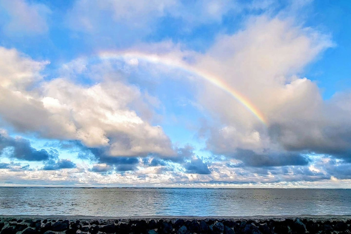 View of rainbow from home's seawalled enclosed private beach with private steps leading to the ocean