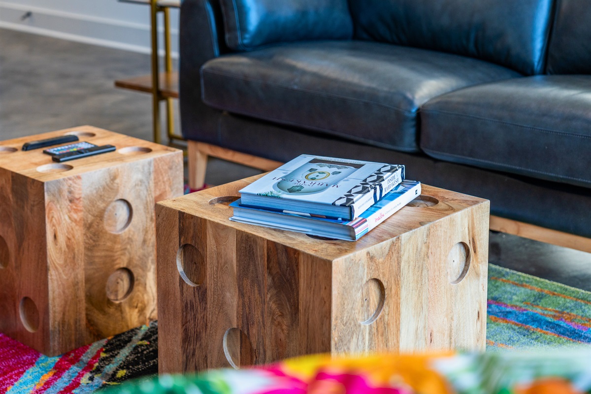 A cozy and charming coffee table arrangement, complete with rustic wooden accents and perfectly curated decor, creating a warm and inviting focal point.