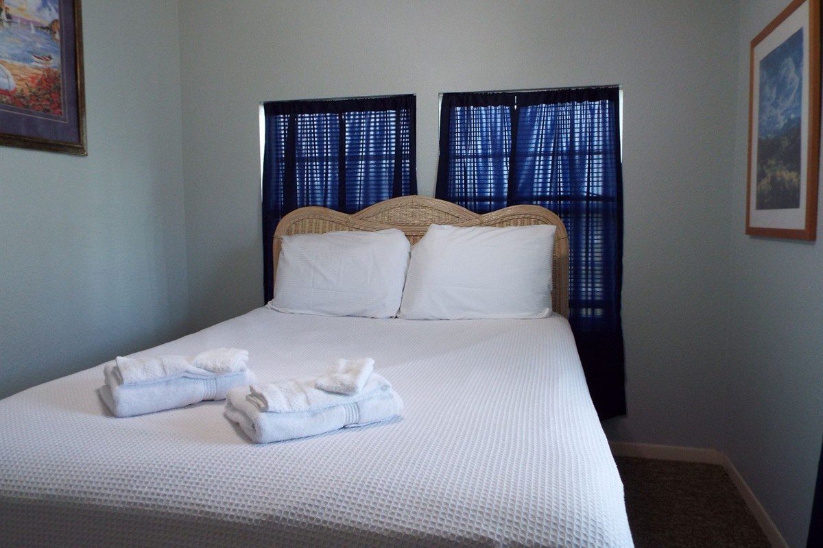 Queen bed with luxury linens