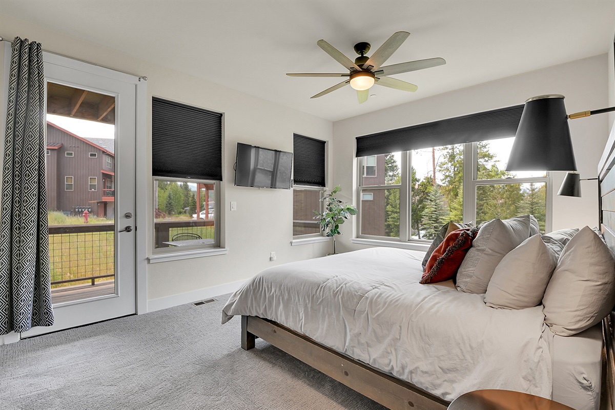Master bedroom with views to the mountains, and showing the private deck