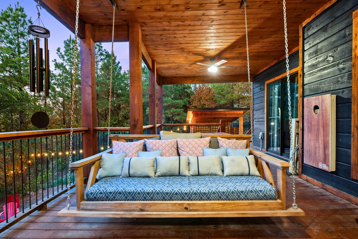 This cozy outdoor lounge invites you to relax and enjoy time with friends or family, whether it's a morning chat or evening under the stars.