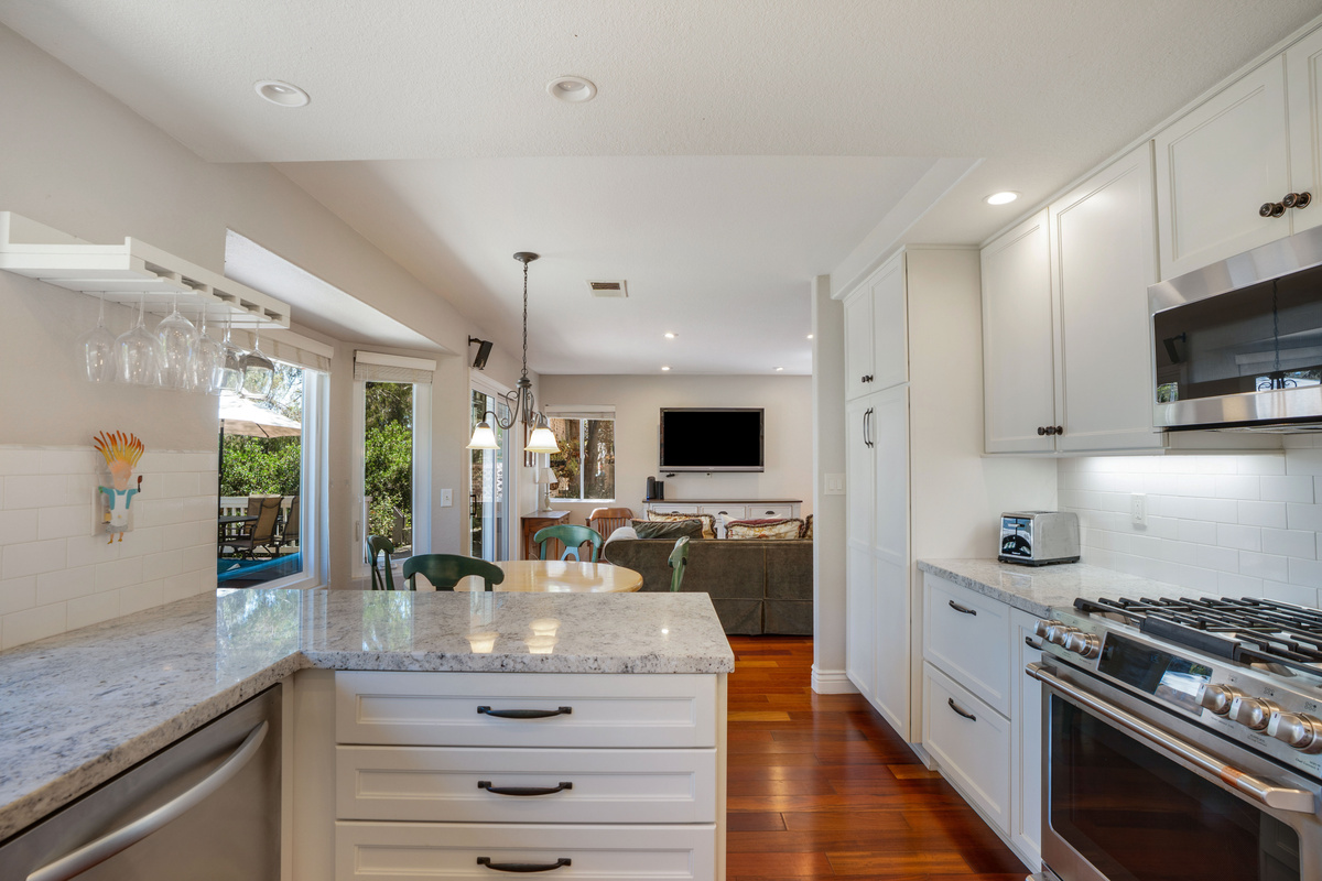 Kitchen, Casual Dining for 4 & Comfortable Family Room with TV and Patio Access