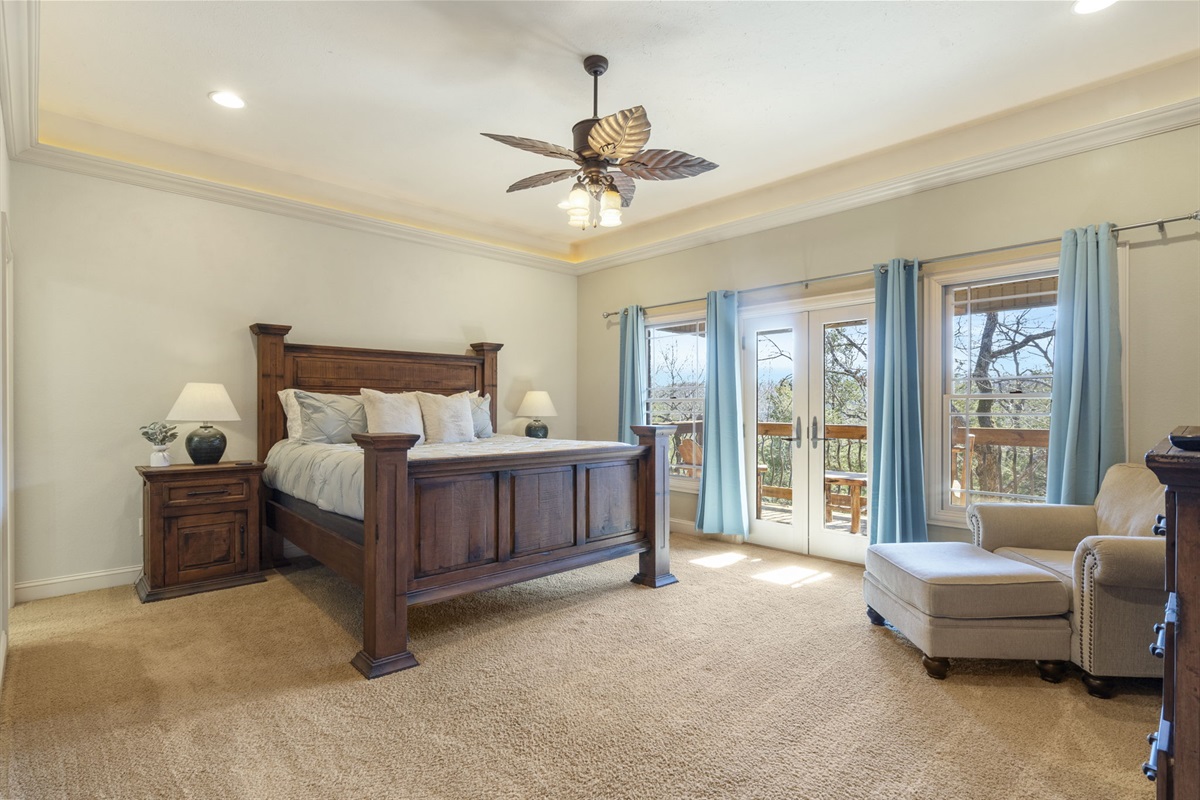 Main level Master King with huge ensuite bathroom, walkin shower, and jacuzzi tub and private balcony