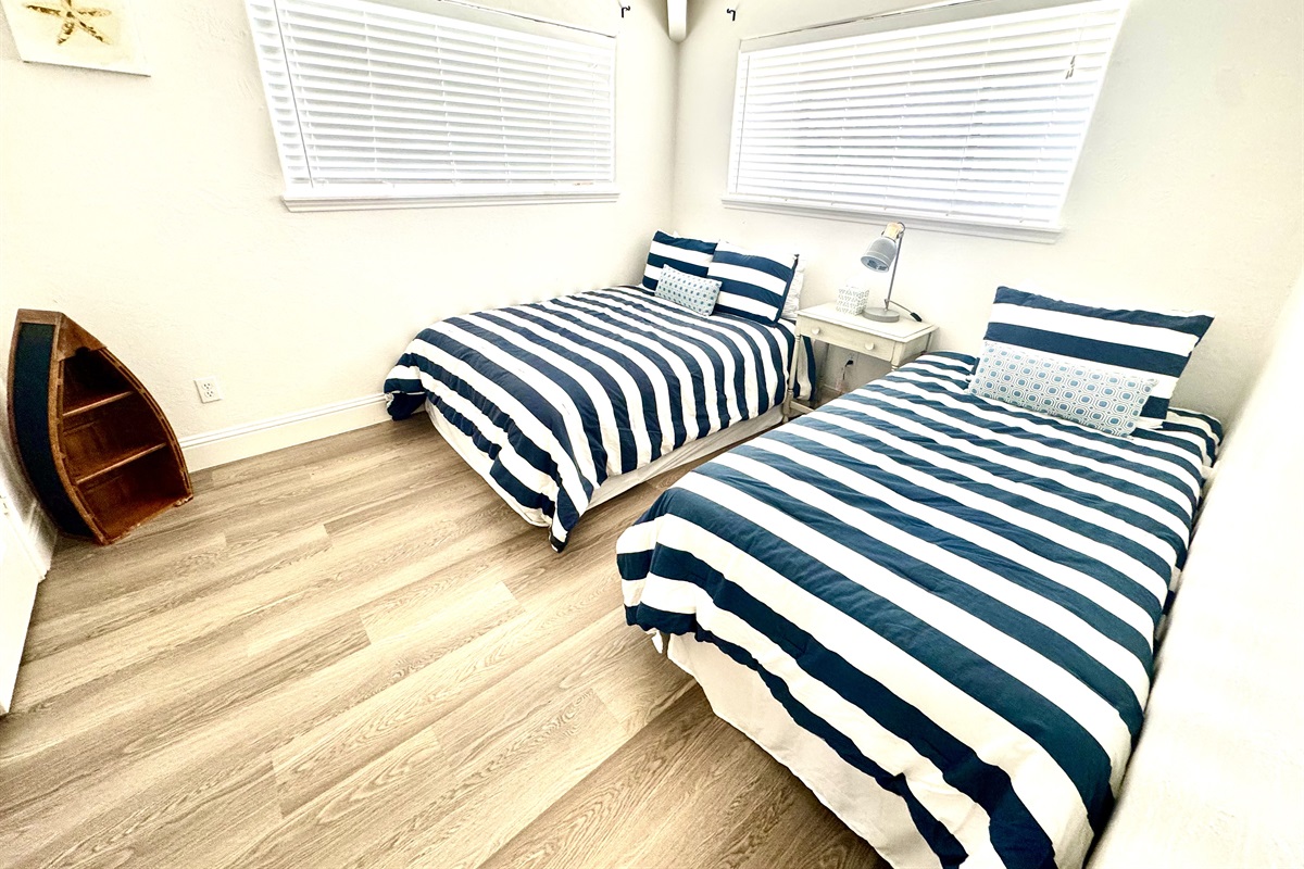 Bedroom with one full and one twin bed