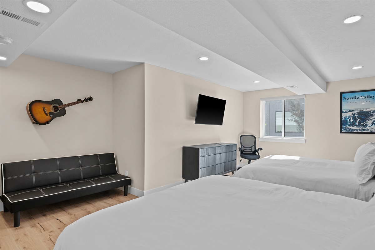 Spacious lower-level sleeping area with comfortable accommodations.