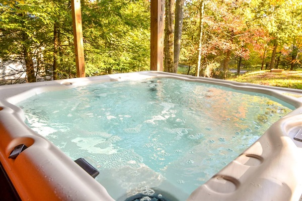 The inviting jacuzzi hot tub for 7 is drained and cleaned after each guest's stays.