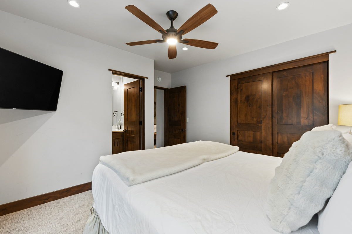 Guest room #3 with King bed, tv, and attached full bathroom