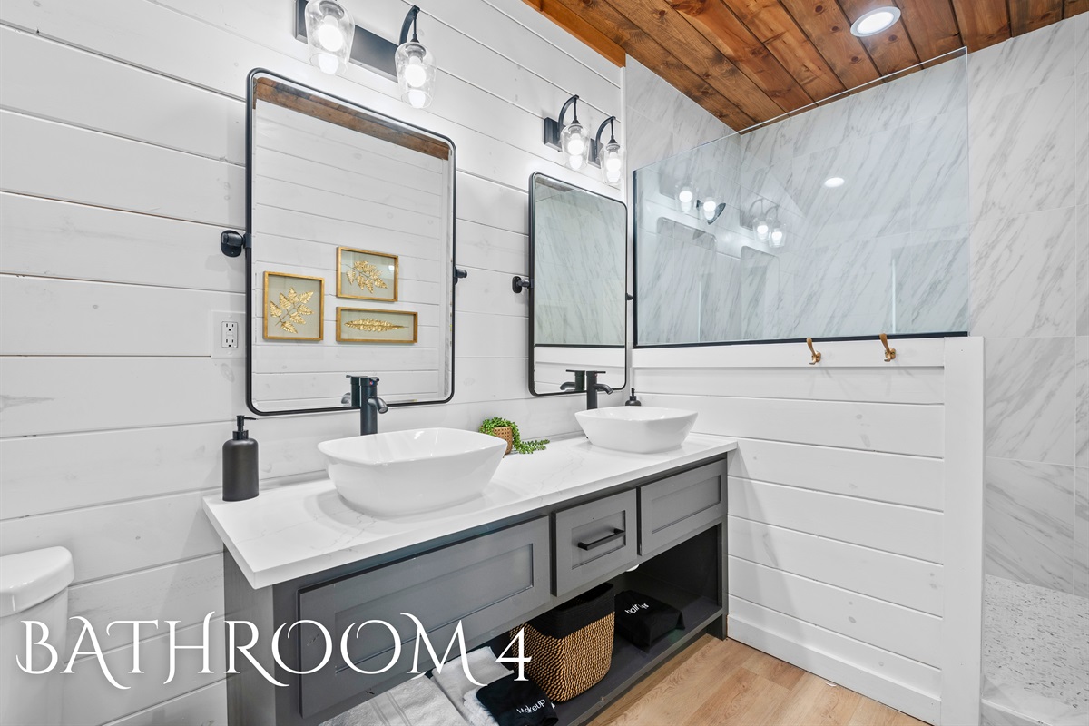 A thoughtfully designed ensuite with upscale finishes and a layout that balances style with functionality.
