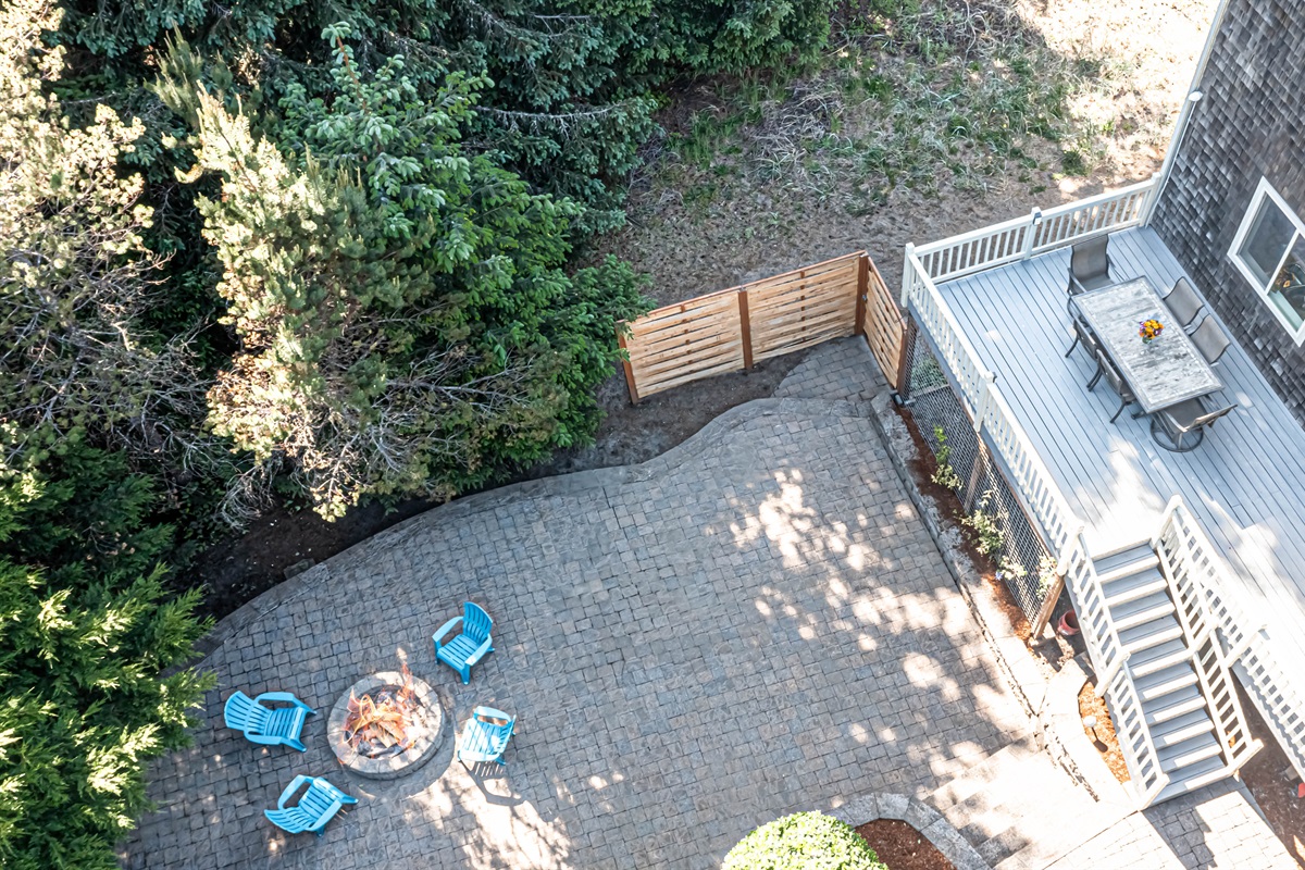 Mature landscaping makes the backyard very private.