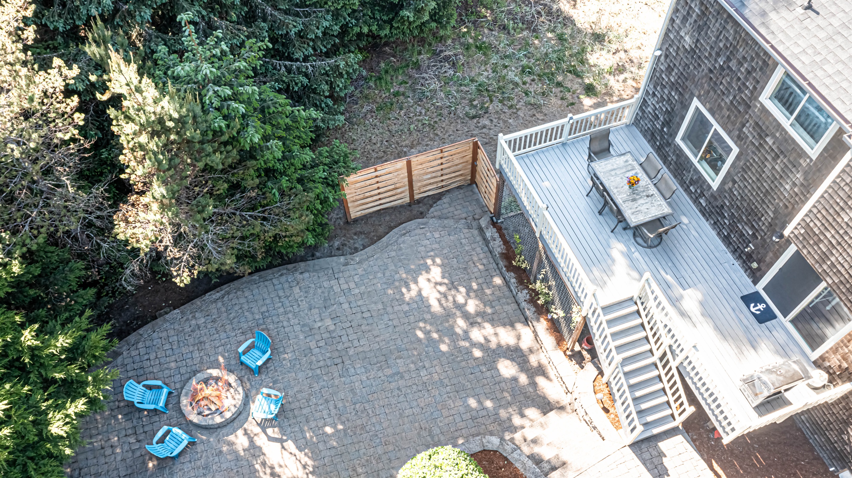 Mature landscaping makes the backyard very private.