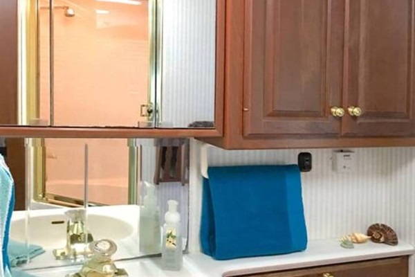 Bathroom Sink, Cabinets and Toilet