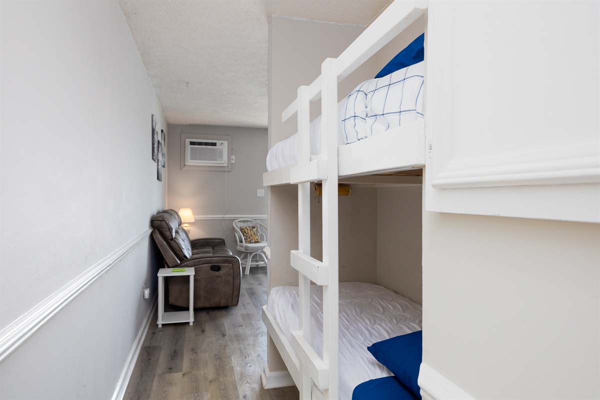 Twin bunk beds in the hallway