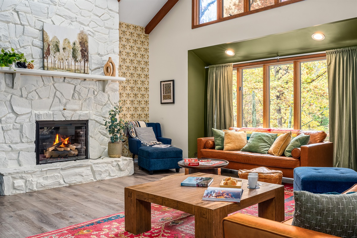 A cozy fireside living room made for slow mornings, movie nights, and everything in between
