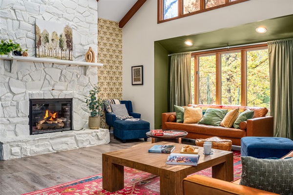 A cozy fireside living room made for slow mornings, movie nights, and everything in between