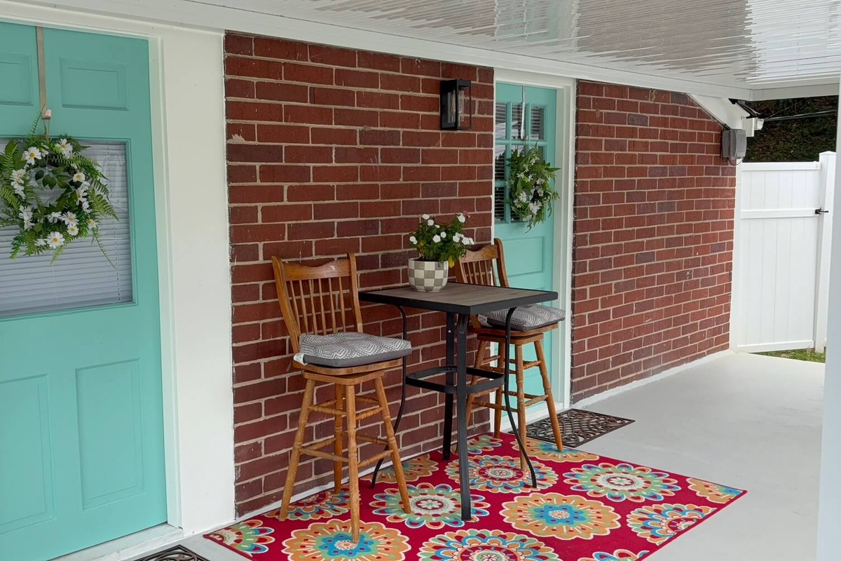 Seating Area underneath the covered porch, entry