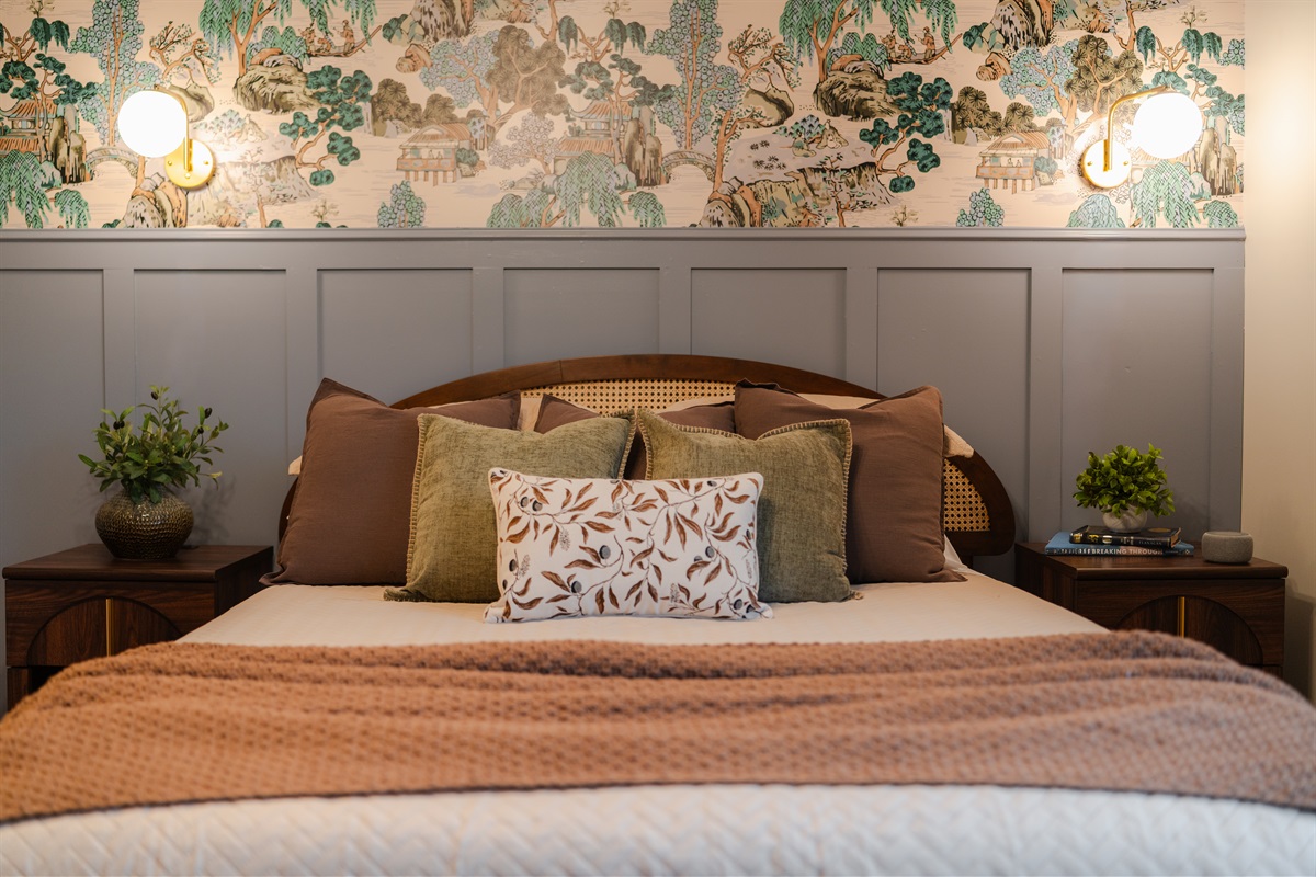 A nice, relaxing bedroom to settle into at the end of the day.