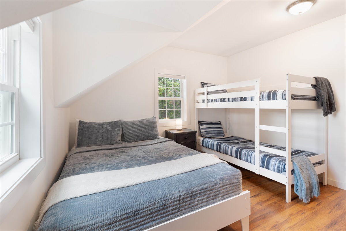 The "bunk room" is dedicated to the rock picking crew. Memory foam mattresses on the queen bed and bunks will make for a comfortable night's sleep. 