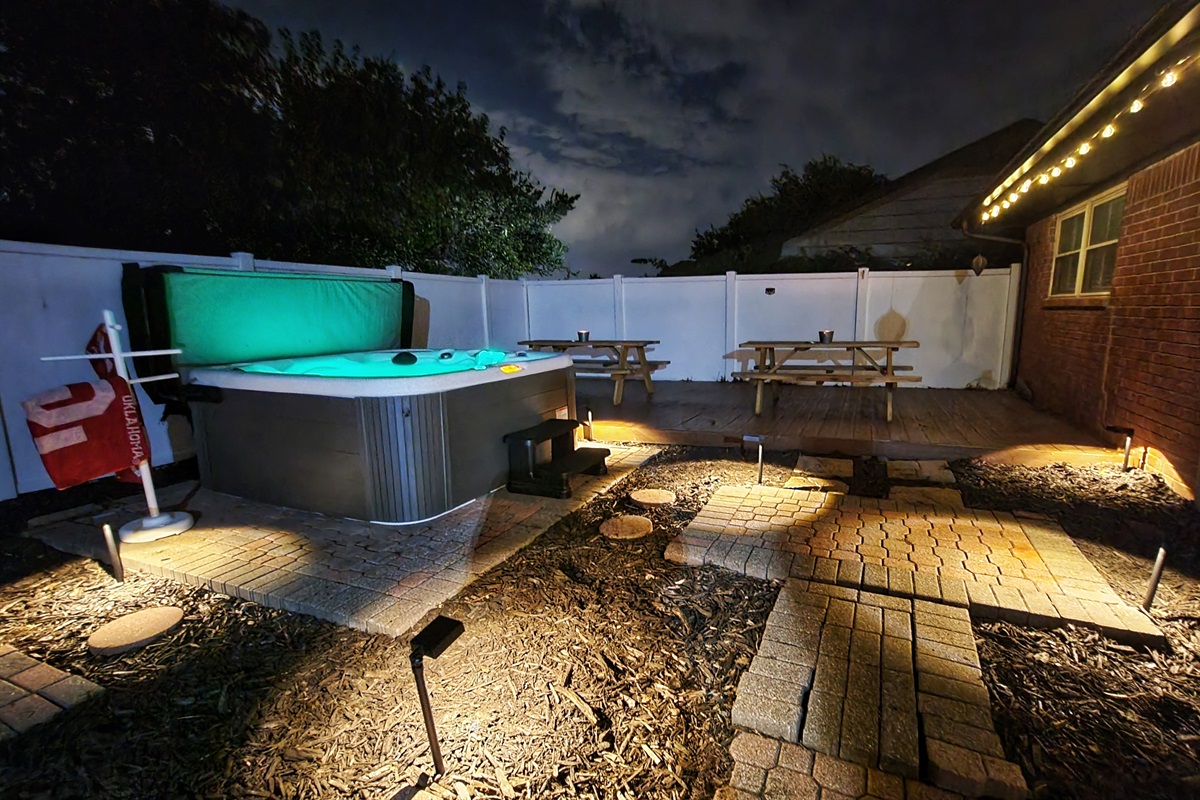 Hot tub, seating, and grill. This place has it all!