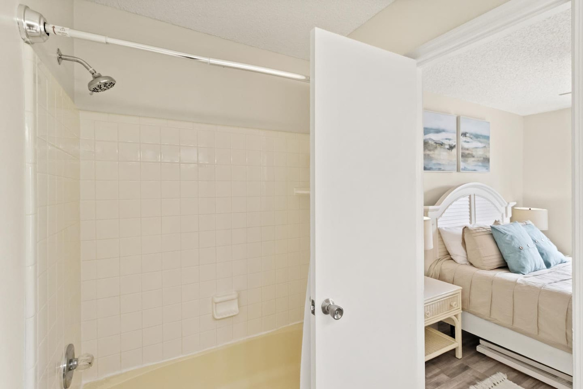 Soak in the tub or take a quick shower &mdash; the queen guest bath gives you both, no compromises.