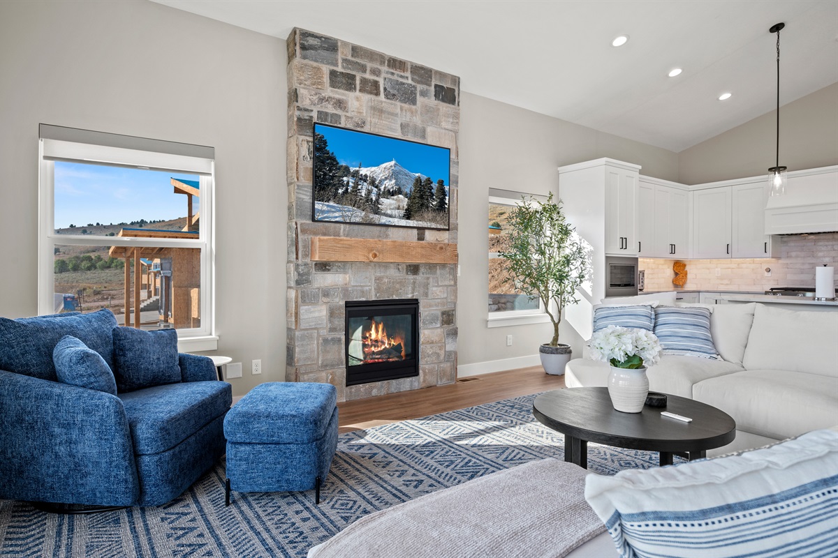 elax by the warm glow of the fireplace or catch your favorite series on the large TV.