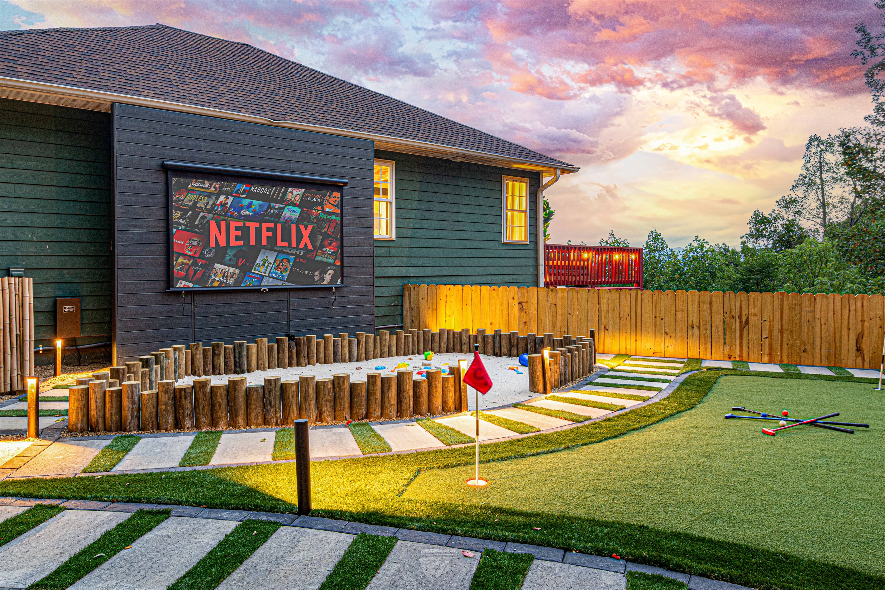 Unwind outdoors with a mini-golf course and a Netflix setup under the sunset sky. Perfect for entertainment and relaxation during your stay.