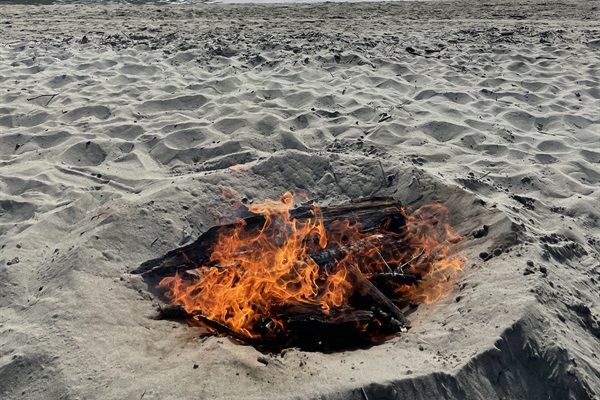 Camp fire on the beach