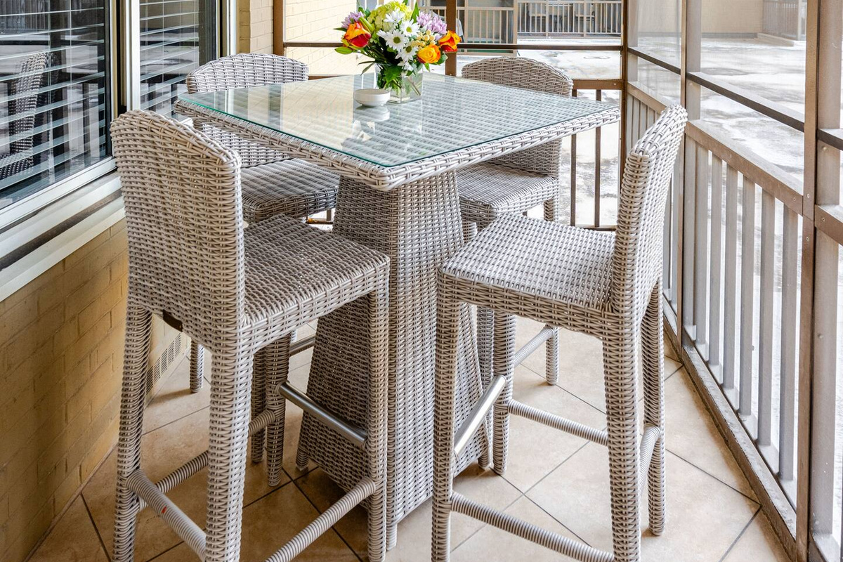 Private balcony w/ seating, ideal for fresh air & quiet moments.