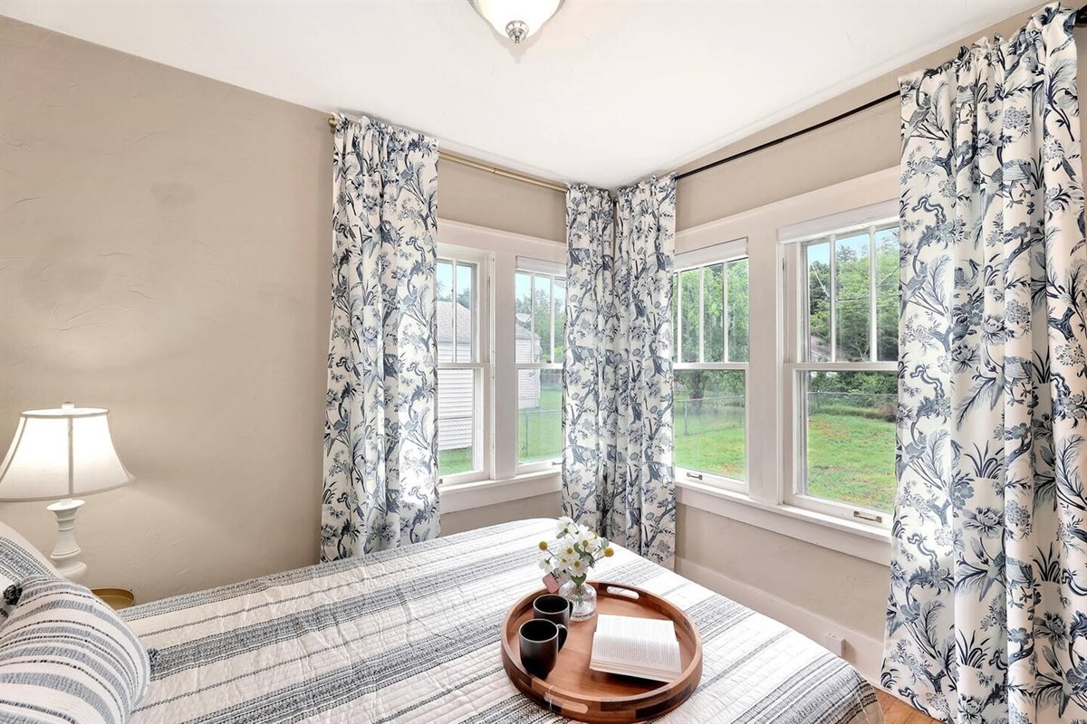 Full size bed off the sunroom in kitchen.  This area does not have a closet or door.