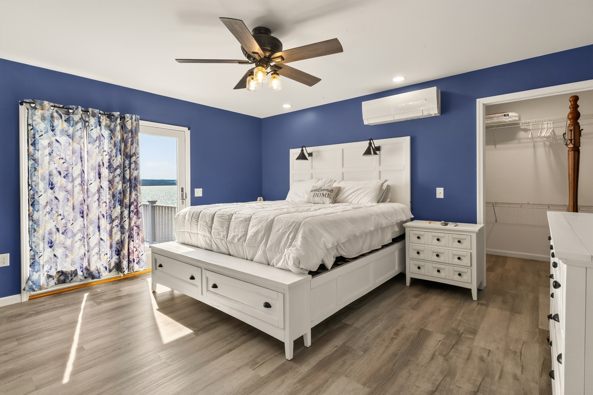 Bedroom with lake-facing sliding glass doors