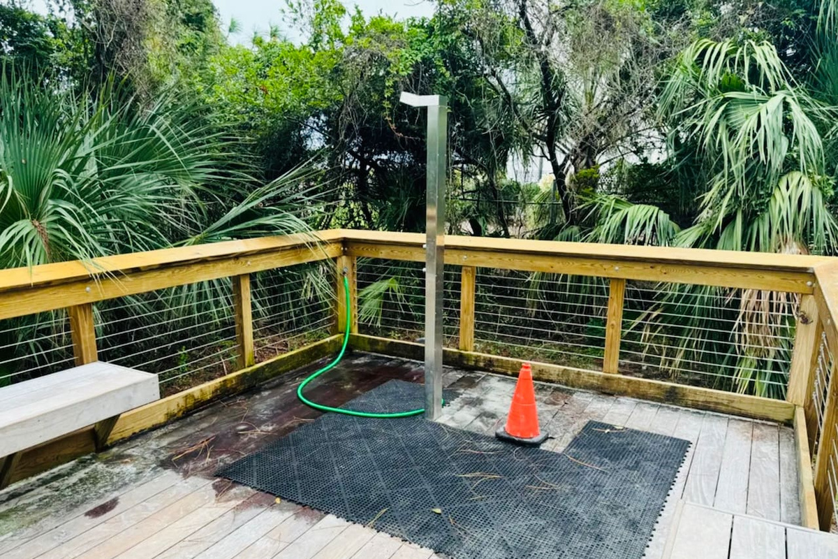 Beach shower by the boardwalk