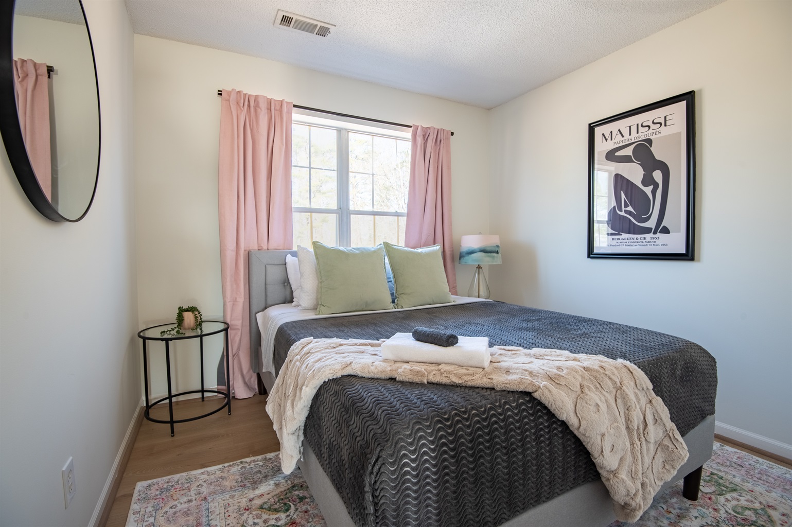 Our peaceful front queen bedroom is designed for peaceful rest just steps away from the kitchen and living room, where you can binge-watch all your favorite TV shows!