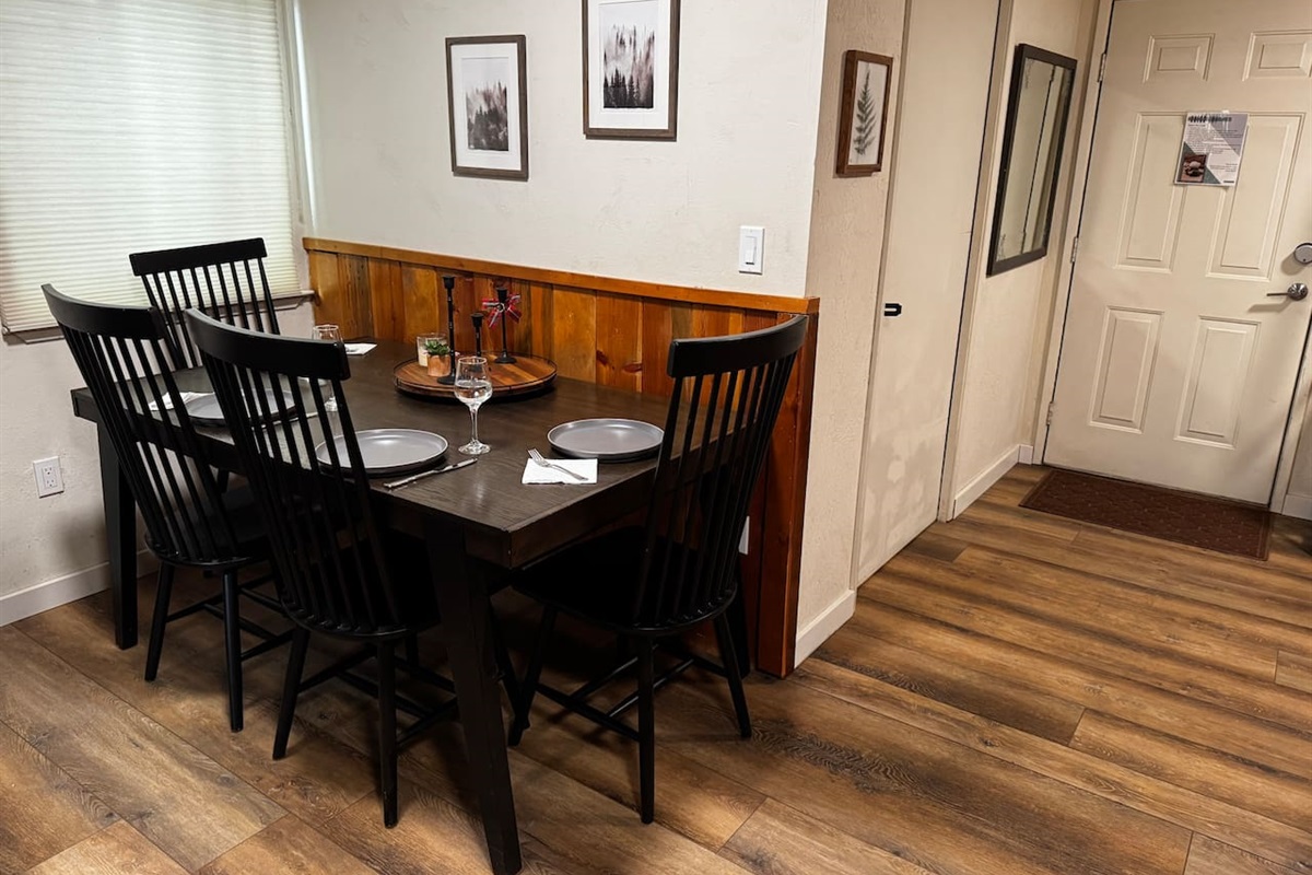 Four chairs and a bench accommodate the whole family in this space. We also offer a chair-mounted booster for the little ones. 