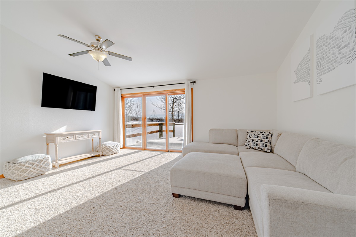 Spacious upstairs living room with a new comfy sectional couch!