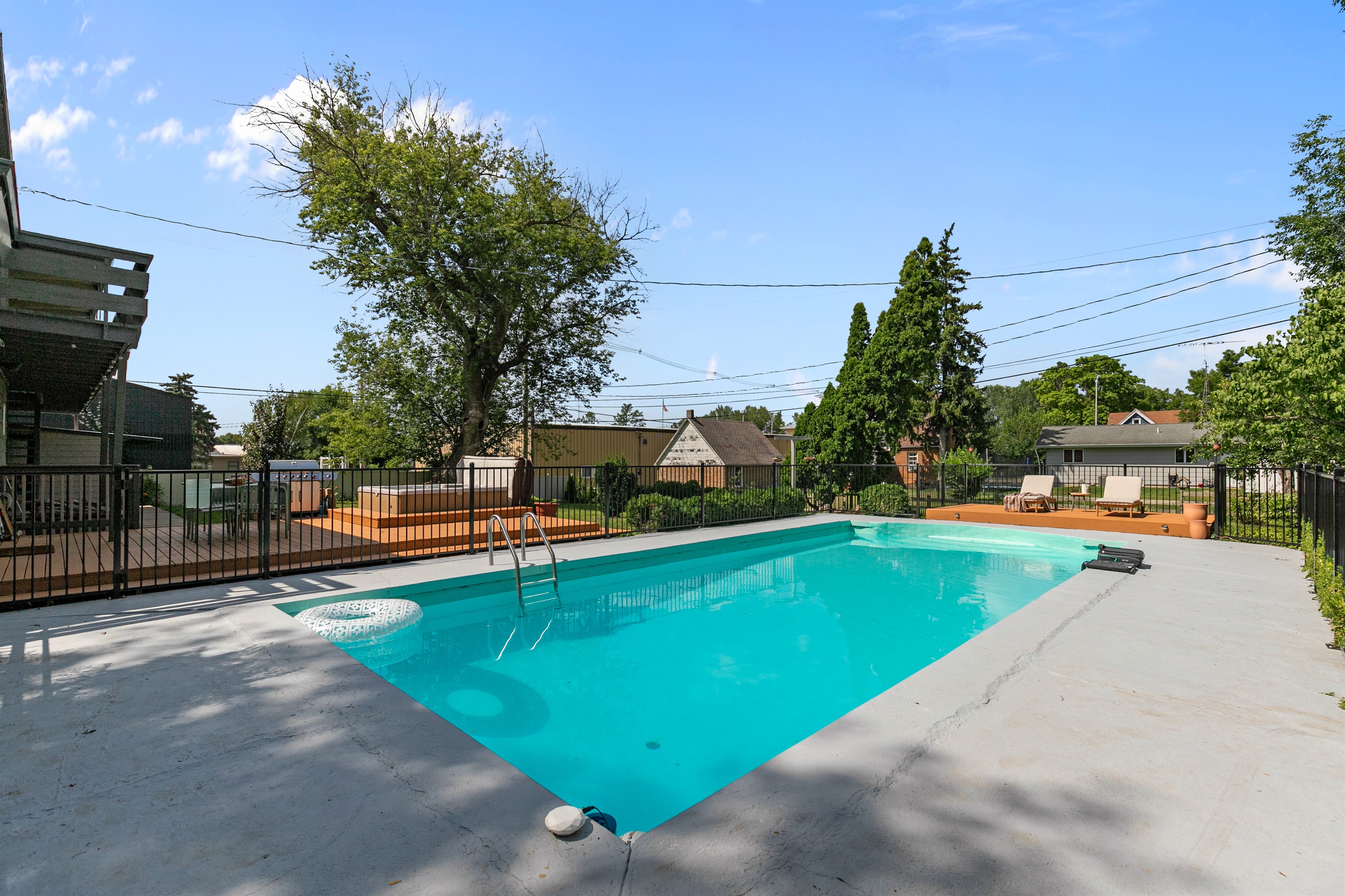 The large fenced-in pool area offers both fun and peace of mind, giving you plenty of space to relax, play, and enjoy the water safely.
