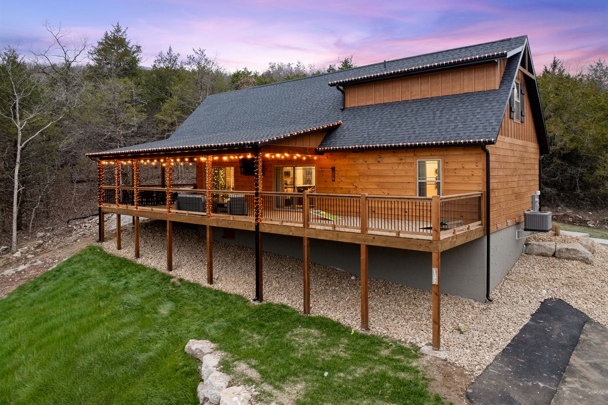 Soft lighting and natural surroundings create a relaxed outdoor feel.