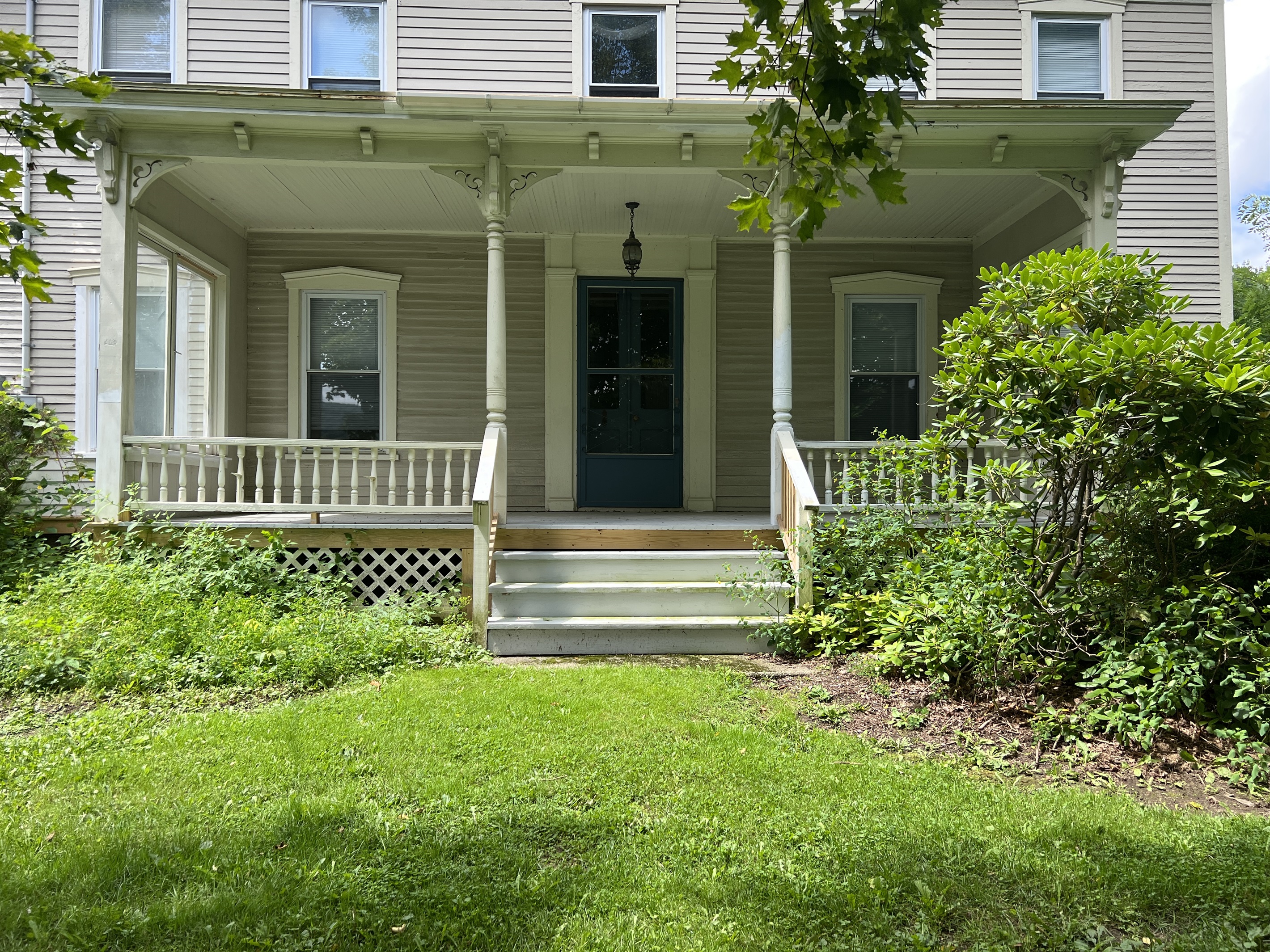 The Federal House classic front porch.