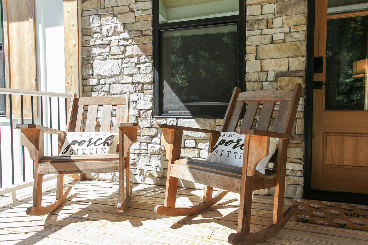 Slow down and enjoy a little front porch sitting in the wooden rocking chairs at Robbin’s Nest on Snowbird Creek.