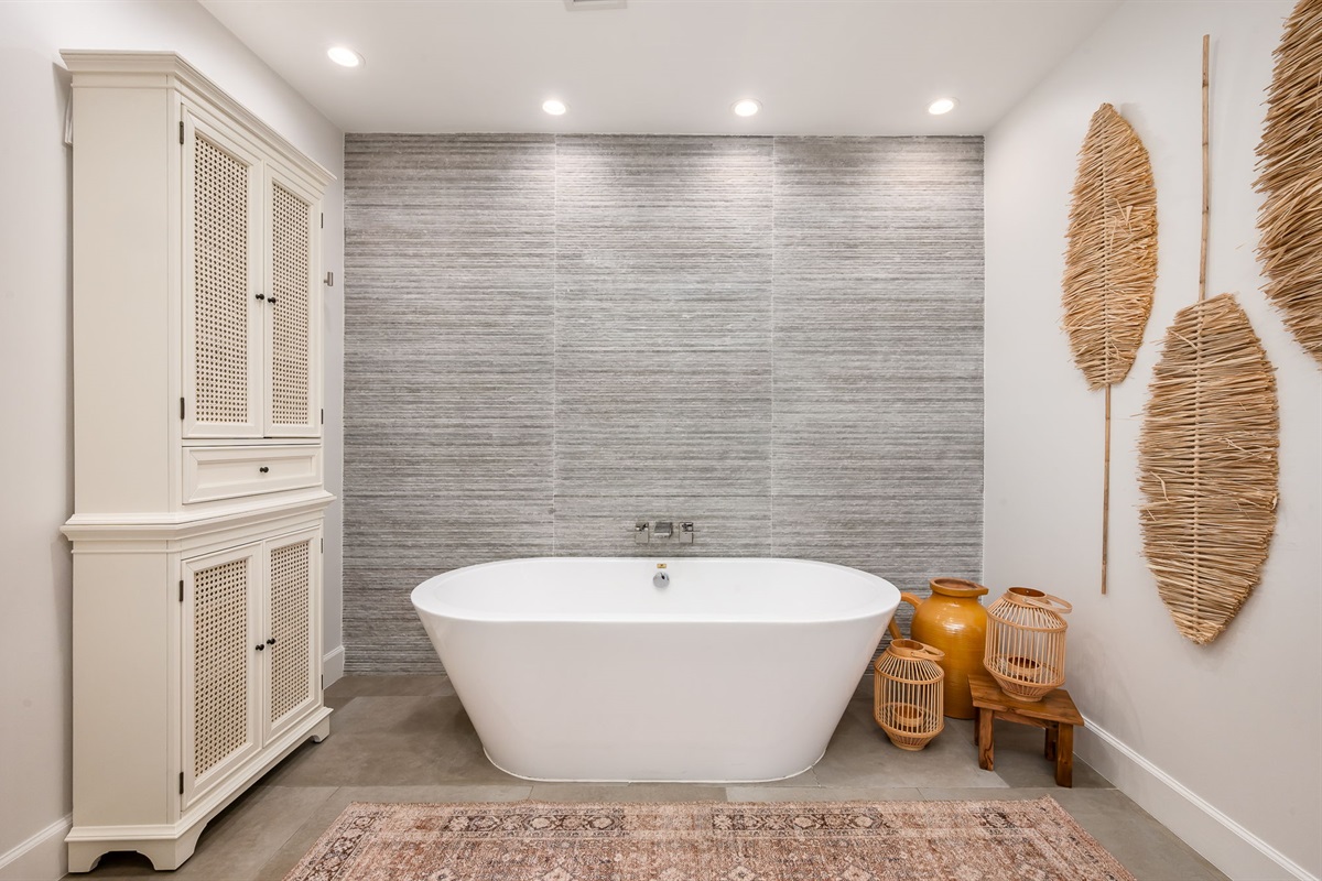 Relax and recharge in the soaking tub after a sun-soaked day at the beach.