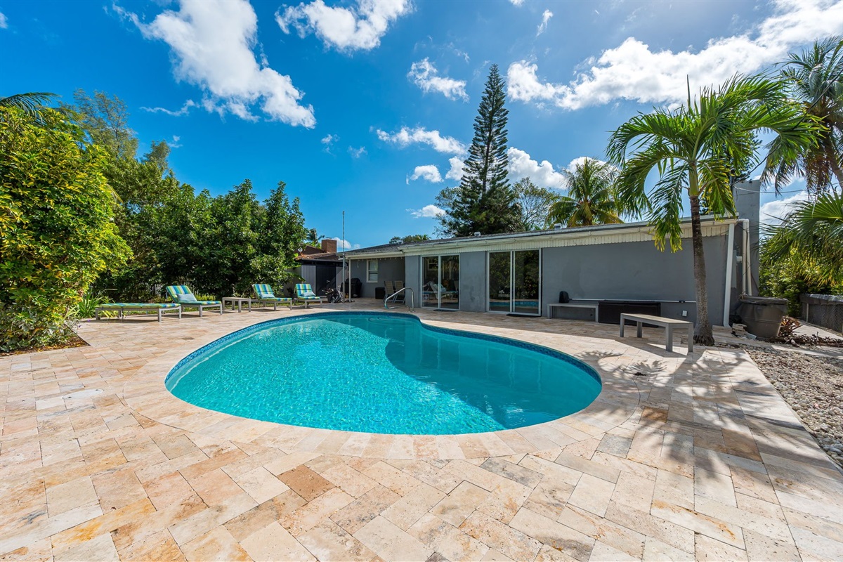 The outside is a highlight, with the heated pool, outdoor sun- loungers, BBQ and covered dining area.