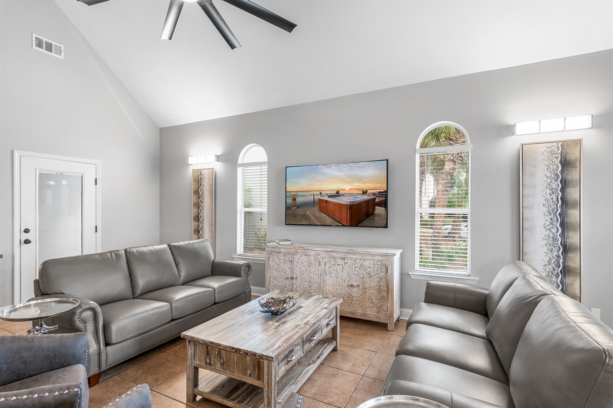 Living room with Smart TV and abundant natural light