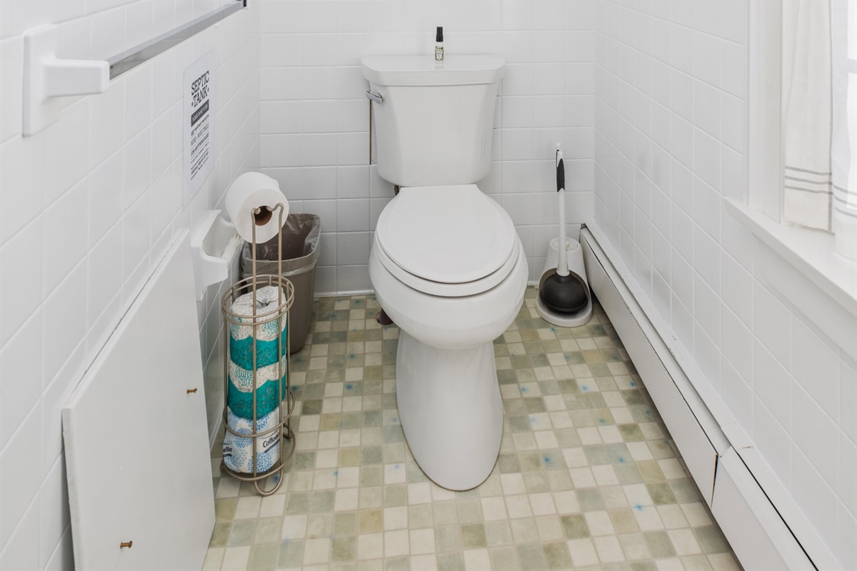 Shared Bathroom at top of landing including standard tub