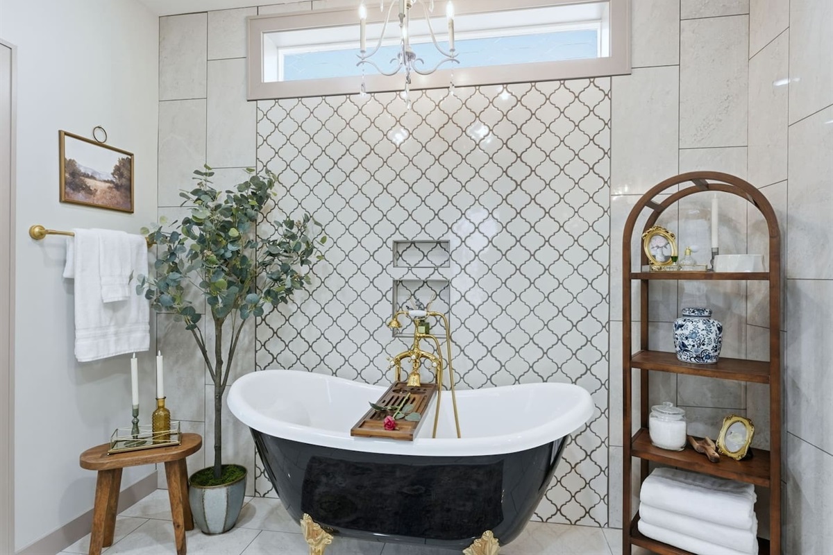 Beautiful bathroom retreat featuring a freestanding tub and stylish decor